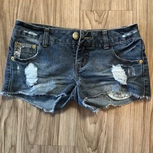 Dark denim shorts with sequin accents